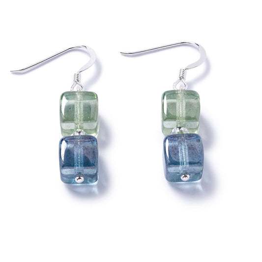 Pair of earrings with green and blue rectangular beads on a white background